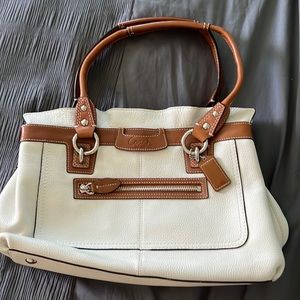White and brown Coach purse